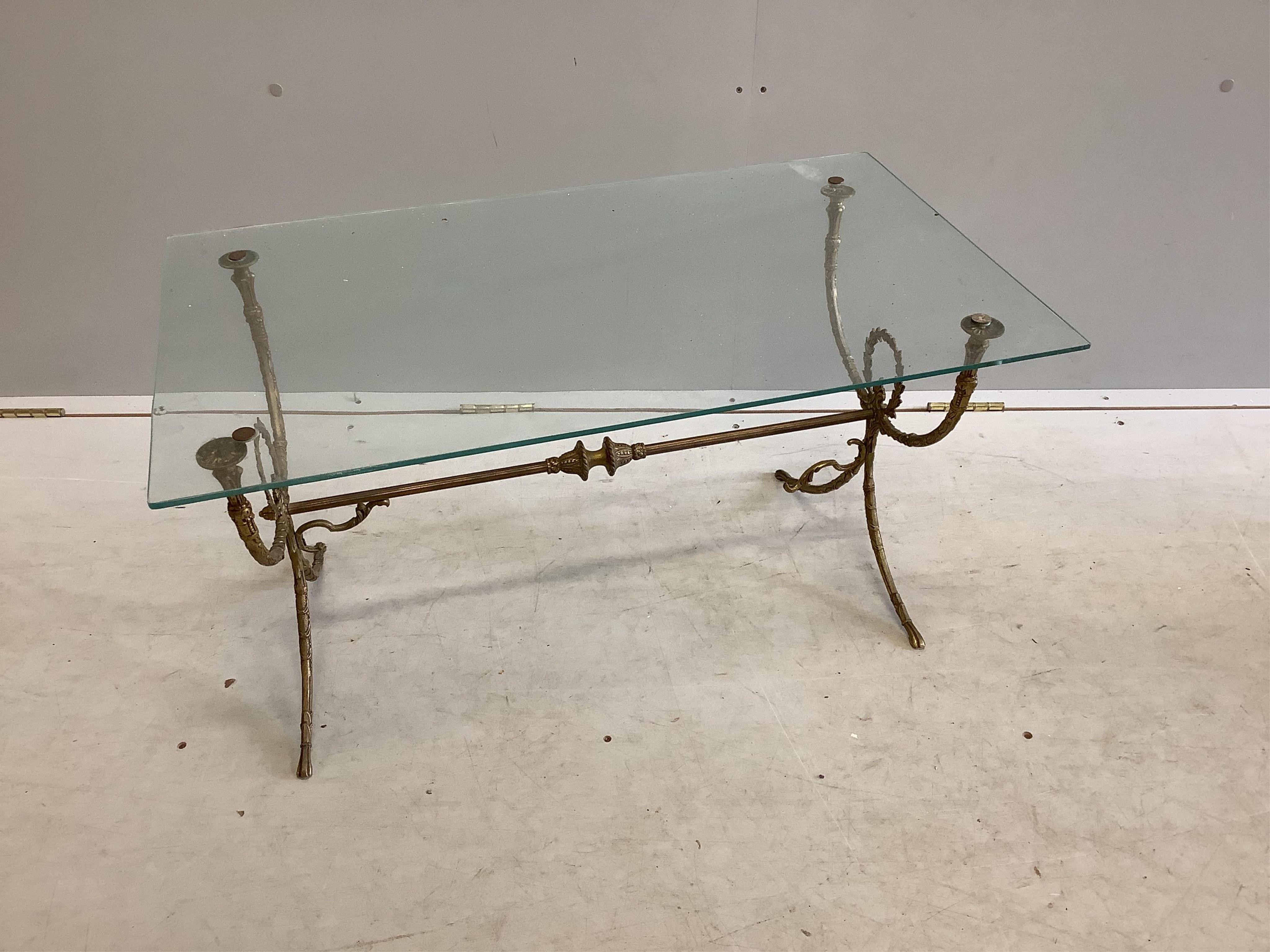 A rectangular gilt metal glass top coffee table, width 79cm, depth 46cm, height 40cm, together with a gilt composition two tier standard lamp table. Condition - poor to fair